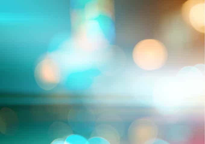 Defocused city skyline with warm and cool bokeh lights